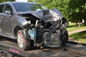 Vehicle with front end smashed from car accident 