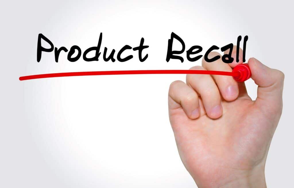 Hand writing inscription Product Recall with marker




